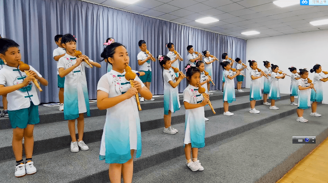 悠扬葫芦丝 吹响西华小学校园特色文化